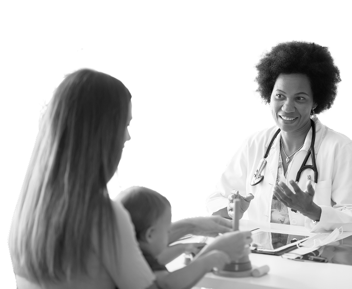 Pediatrician speaking with a parent and child Pediatrician speaking with a parent and child